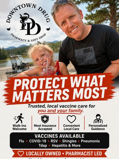 Father and daughter promoting local vaccine care at Downtown Drug.