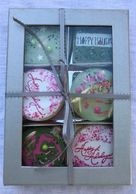 A dozen cookies in a beautiful gift box