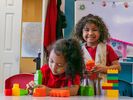 Children learn to share their toys and make friends.