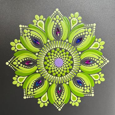 a green color mandala art design