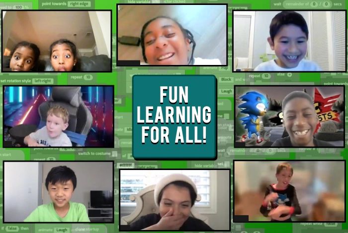 Kids smiling and coding video games during an after school program.