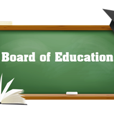 An image of a chalk board with "Board of Education" written in white chalk