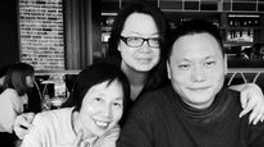 Howard Lee with his fat and ugly wife, Cherrie Lin.