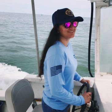 Yesenia Gutierrez at the helm of treasure salvage vessel - Pandion