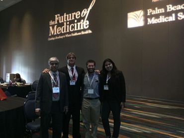 Bradley Williamson and fellow medical researchers at the Future of Medicine conference.