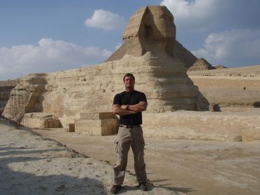 Bradley Williamson at the Giza Plateau in front of the Sphinx and the Great Pyramid.