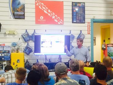 Bradley Williamson doing a public speaking presentation.