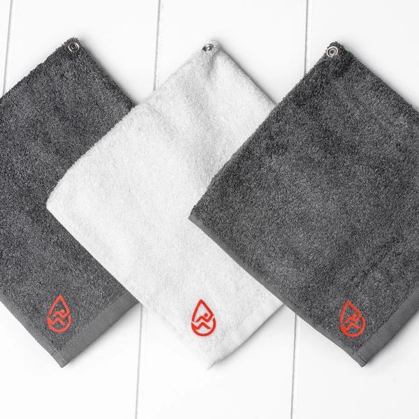 Retractable towels shown in both white and grey.
