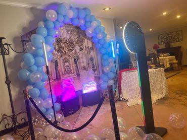 The Selfie Booth Experience unlimited pictures complete with stage lighting and props.