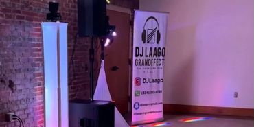 DJ and MC complete with stage lighting.