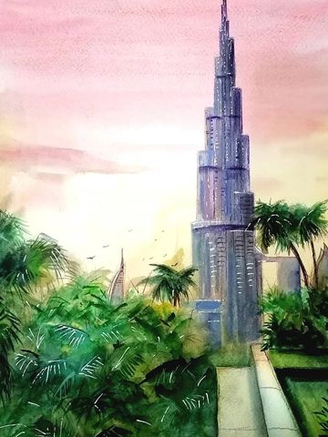 Burj Khalifa against pink sky and greenery in the foreground