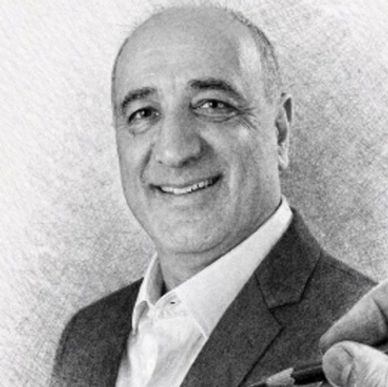 Portrait of a middle-aged man smiling.