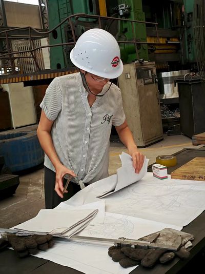 hebei foundryman tech engineer is checking drawings carefully