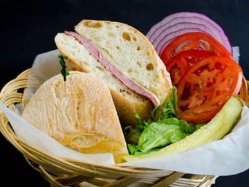 German Salami Sandwich served with choice of bread, cheese , lettuce tomato, onions, pickles.