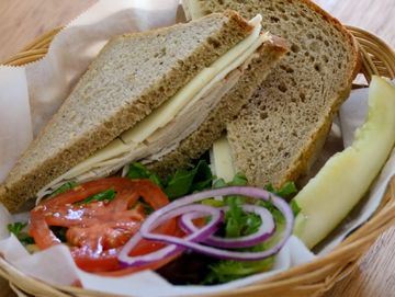 Tuna Sandwich o German Rye Bread with tomato, lettuce, onions, german mustard and pickle