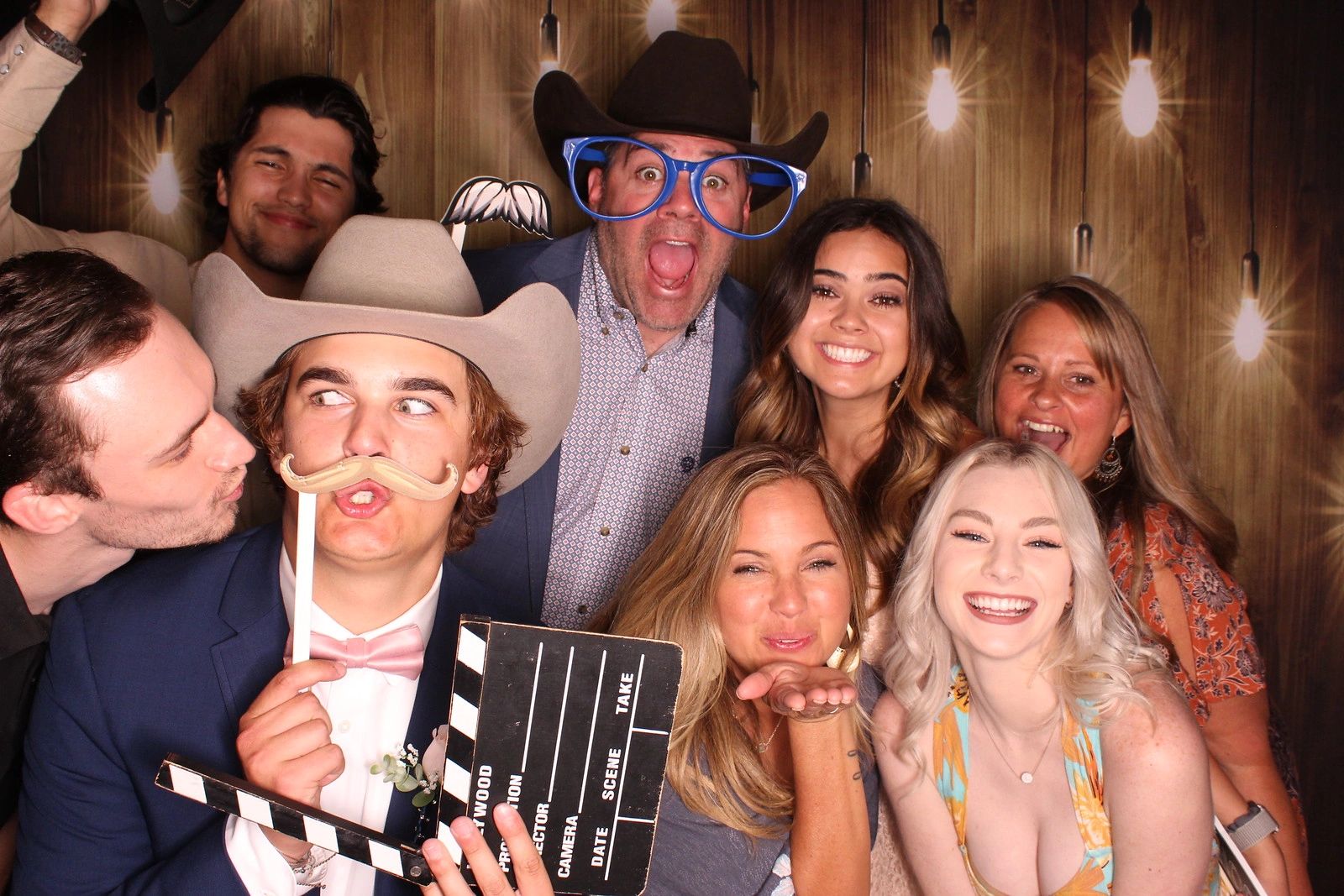 Wedding Guests having fun in a group shot in the photobooth in Mint Hill, NC