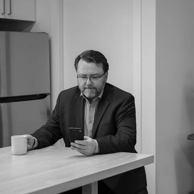 Edmonton Business coach reading email