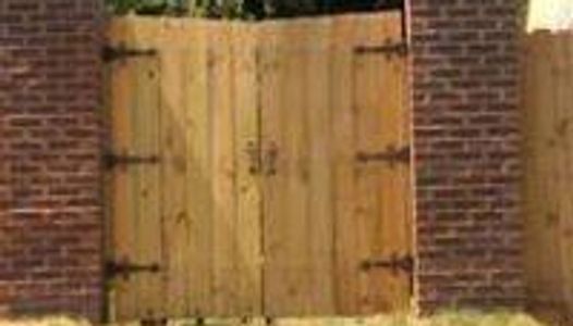 gate to a fence, pillars brick,hardscape,fence installation,gate