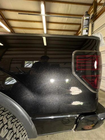 Swirl mark removal during professional paint correction service