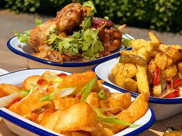 Various dishes served on a catering table for an event in Wrexham.