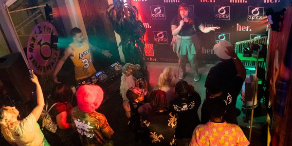 Crowd enjoys music at a vibrant club.