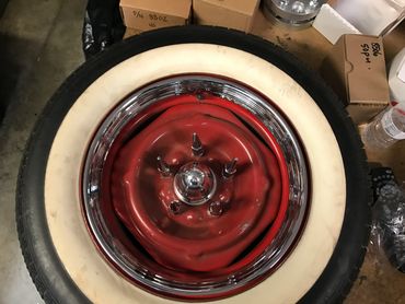 Bullet style center caps and chrome spike lug nuts with Ribbed style trim rings