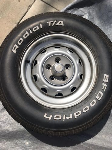 Steel wheel with plastic pop on center cap