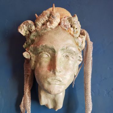 Thetis mother of Achilles clay sculpture with shells and snake skin by Jill Alikas St Thomas