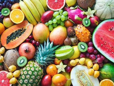 This image showcases a vibrant assortment of fruits, displaying a wide range of colors and textures.