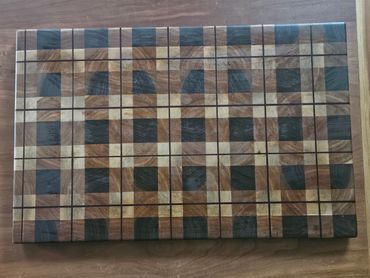 Plaid cutting board 18"x28" cherry, walnut, maple with padauk stripes