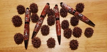 Pens sweetgum pods in epoxy resin