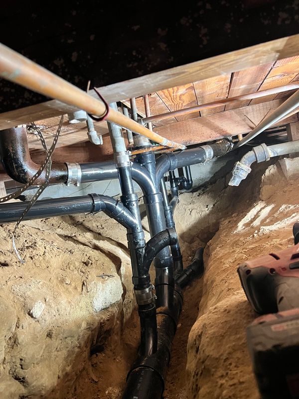 Repipe under house from cast iron to abs pipe