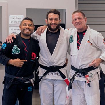 Brazilian Jiu Jitsu black-belt Adrian Amaya with Masters Cleber Luciano and Sean Cooper