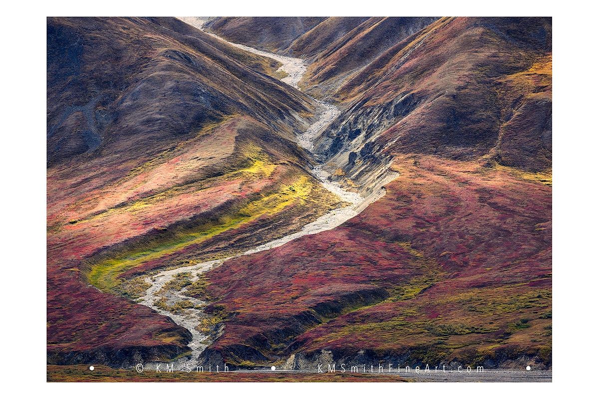 Taken in Denali NP, "River of Time 2" depicts the Alaska tundra colors in autumn and glacier flow.