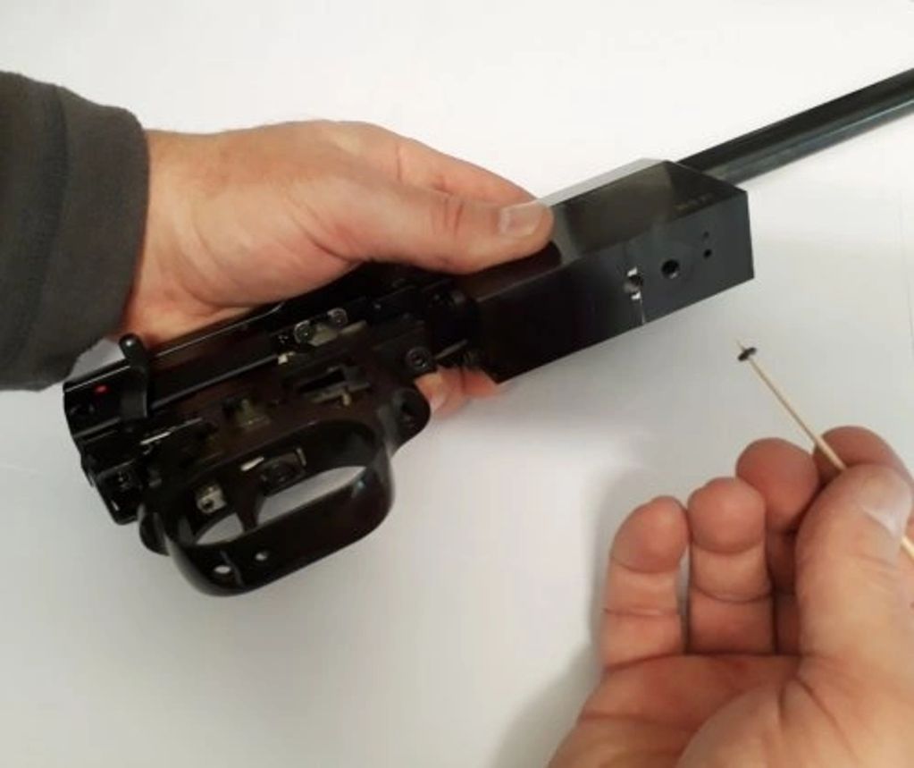 Removing the oring seal using a cocktail stick from the regulator pressure test port of a HW100
