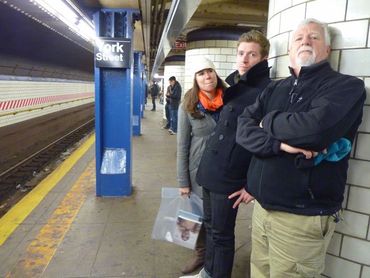 photo of people waiting for a train