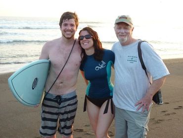 family having fun at the beach