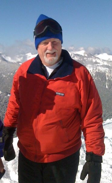 grandfather wearing red puffy jacket