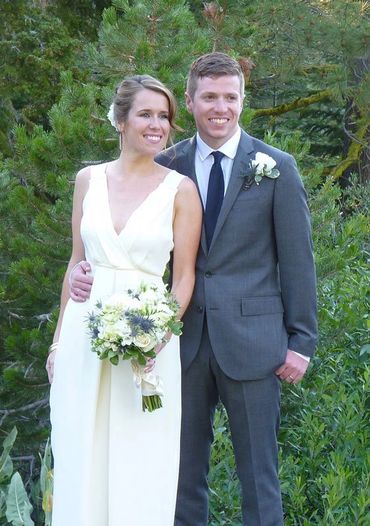 bride and groom posing for photo