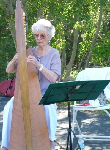 woman preparing musical instrument