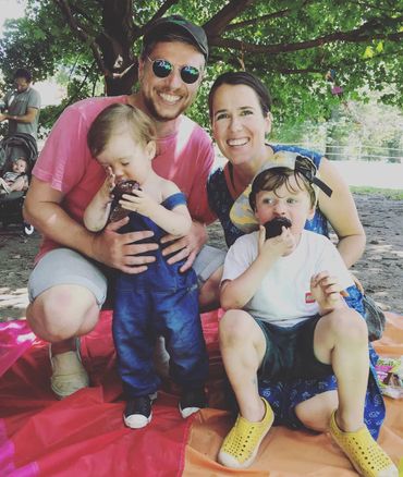 family photo on a colorful blanket