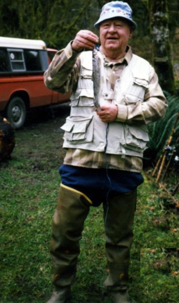 grandfather wearing fishing gear