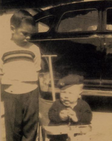 old photograph of children and black car