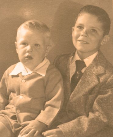 old photograph of children in coats