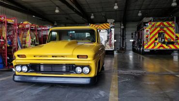 Yellow C10 in front of fire engines