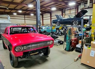 1961 Ford Falcon Gasser with hot pink custom paint and 1965 Pontiac GTO convertible with LS3 swap.