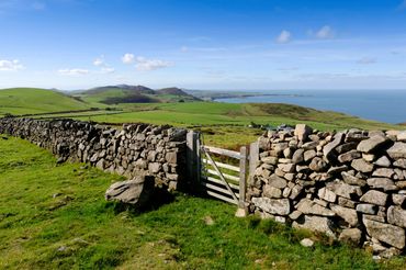 View from the fields above Arallt Holiday cottage looking out to the coast of the Llŷn Peninsula
