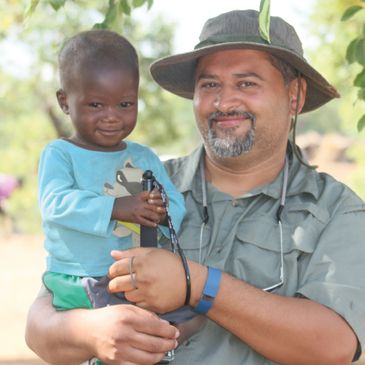 Dr Khan and Joshua. Malawi.