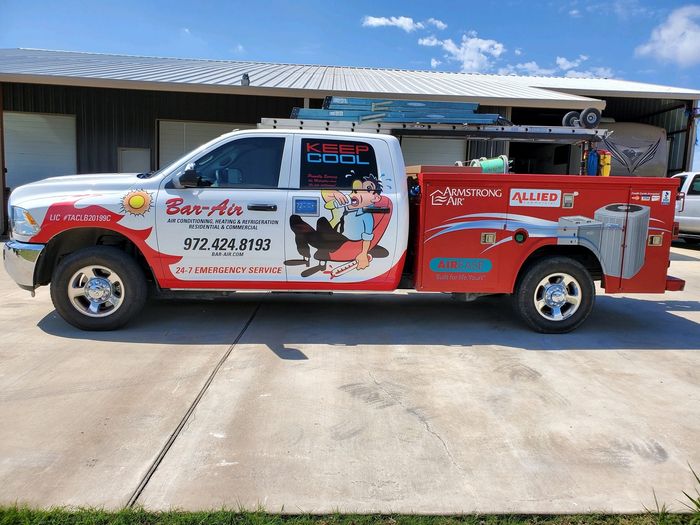 Bar-Air service truck with HVAC branding and emergency contact info.