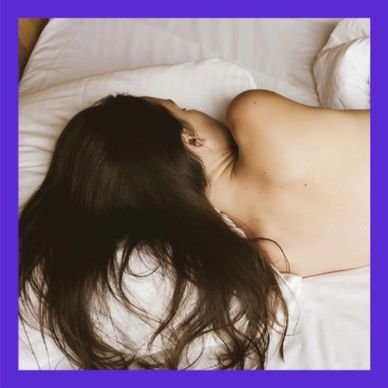 Naked with no underwear on the screen/frame, showing only the shoulders, back and thighs.